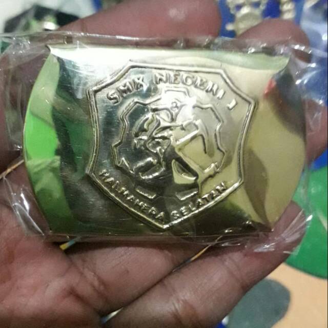 kepala gesper sabuk smkn 1 hal sel