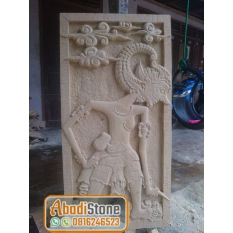 relief batu pewayangan dekorasi hiasan batu alam ukir dinding batu paras Jogja abadistone