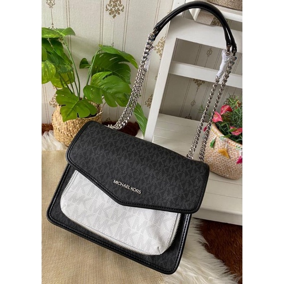 MK Regina medium flap black multi nwt