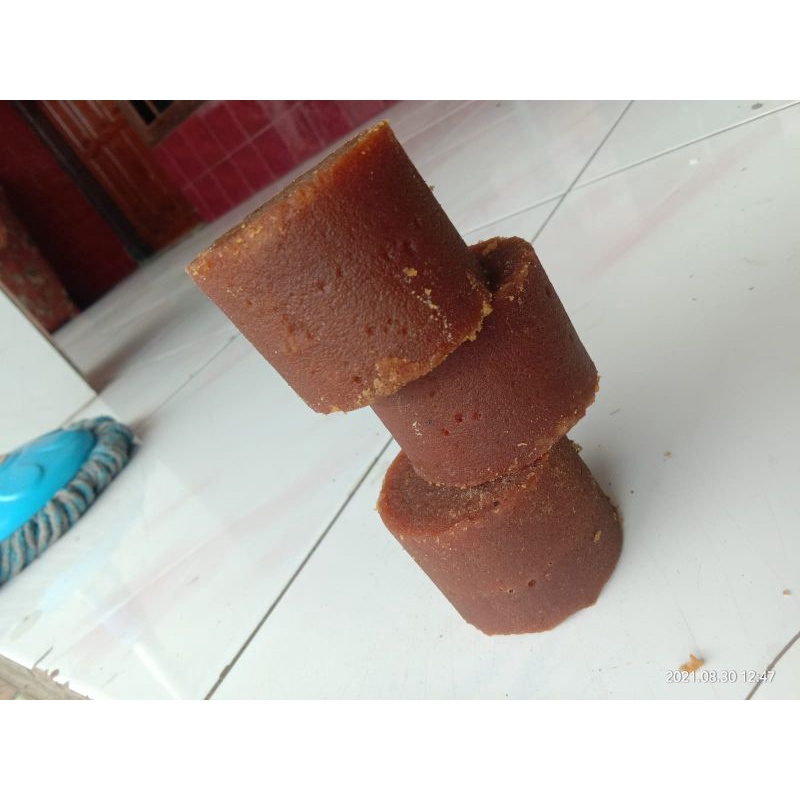 

GULA AREN/KAWUNG BUNGKUS DAUN ASLI 100%
