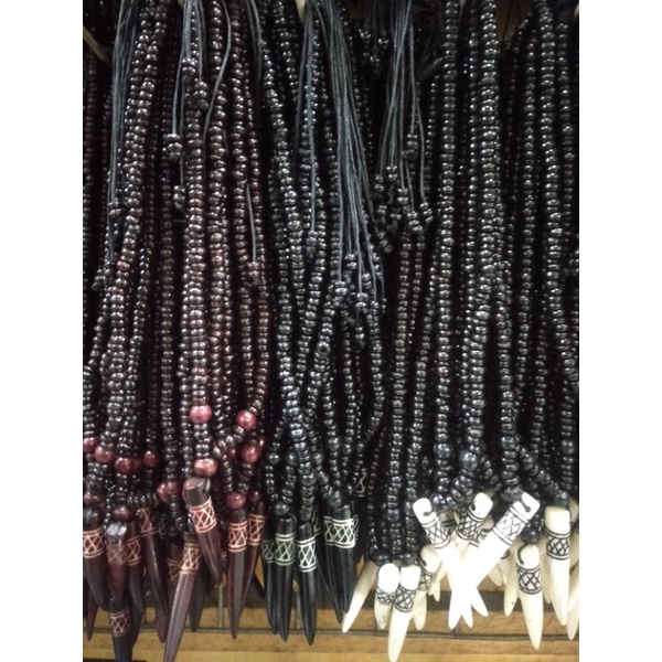 kalung batok bandul taring tulang/kalung metal pria