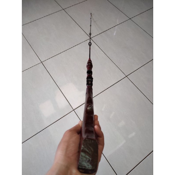 Joran pancing gagang kayu ukir