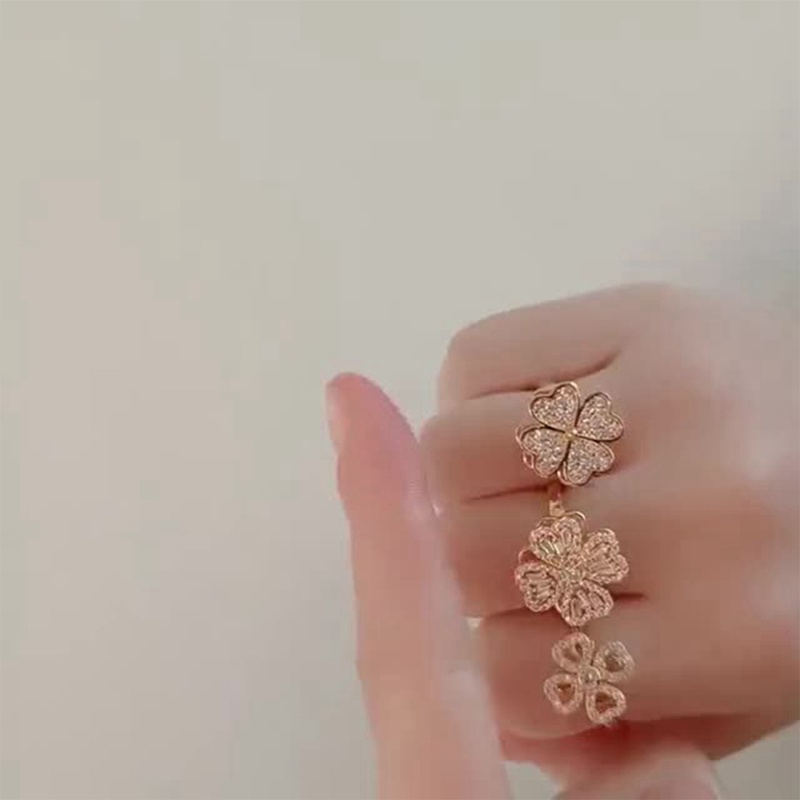 Fancyqube Cincin Desain Daun Semanggi Kincir Angin Bahan Zirkon Dapat Diputar Untuk Wanita