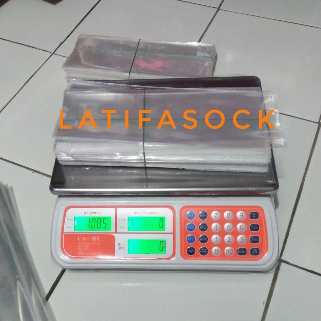 Plastik OPP Untuk Kemas Kaos Kaki Ukuran 11 x 27.5 cm - 11 x 29 Tebal 0.4 mm Jual 1 kg Double Press