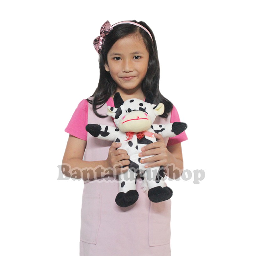 Boneka sapi diri K