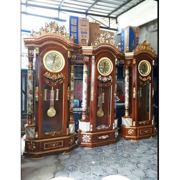 almari jam bandul gadang lonceng ukir kayu jati furniture mebel jepara