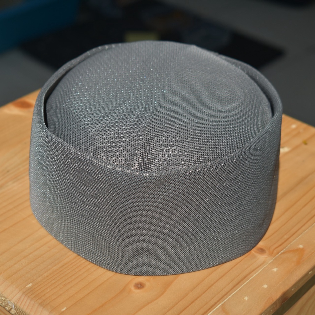 peci taliban lipat merk iqmal warna abu muda motif bintik ukuran stanadar dewasa