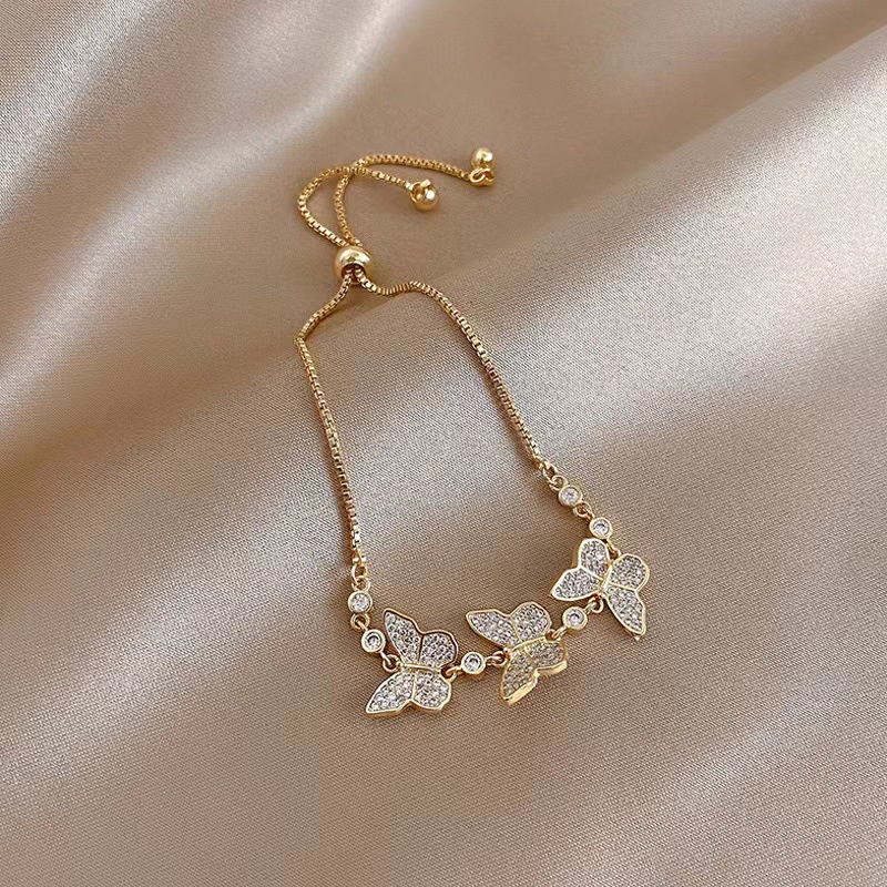 Gelang Tangan Desain Kupu-Kupu Aksen Zircon Warna Permen Untuk Wanita
