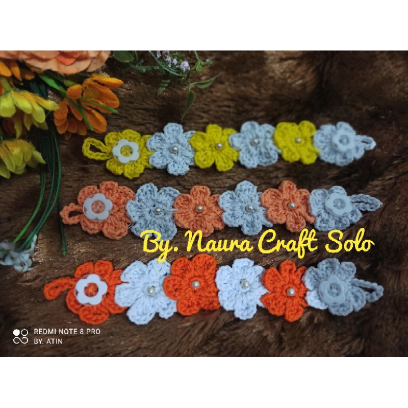 konektor masker rajut bunga