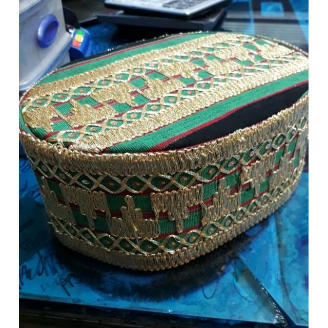 Peci tapis Lampung warna hijau