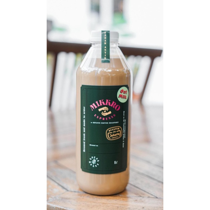 

Oatly Oat Milk Coffee with Organic Gula Aren Es Pasar Antik 1L