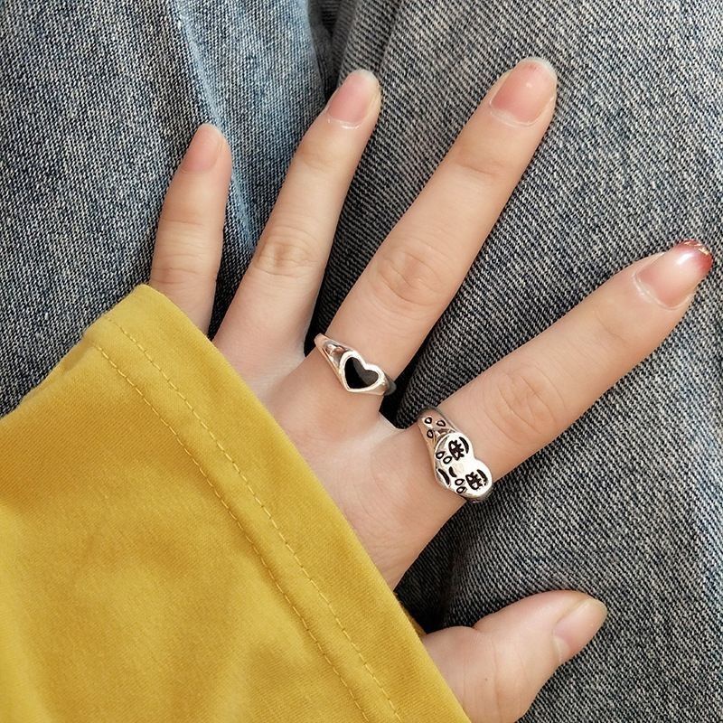 Eropa dan Amerika hitam gelap cinta berbentuk hati cincin cinta menangis wajah cincin wanita retro t