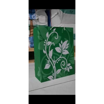

paperbag kraft putih ,cetak full motif bunga,size kecil 18×6×23