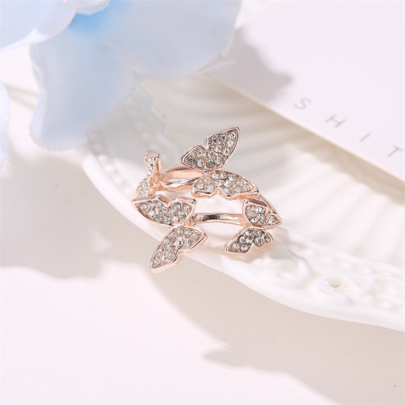 Cincin Desain Kupu-Kupu Aksen Berlian Imitasi Sapphire Warna Silver Rose Gold Adjustable Untuk Wanita