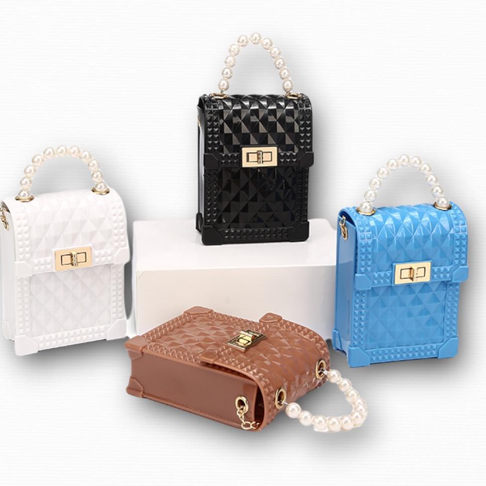 POG.14Jl22ᴳ– Tas Dompet Hp Jelly Mutiara T022 3830