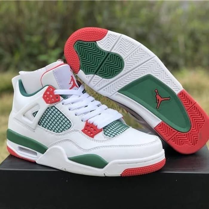 white and green jordan 4s