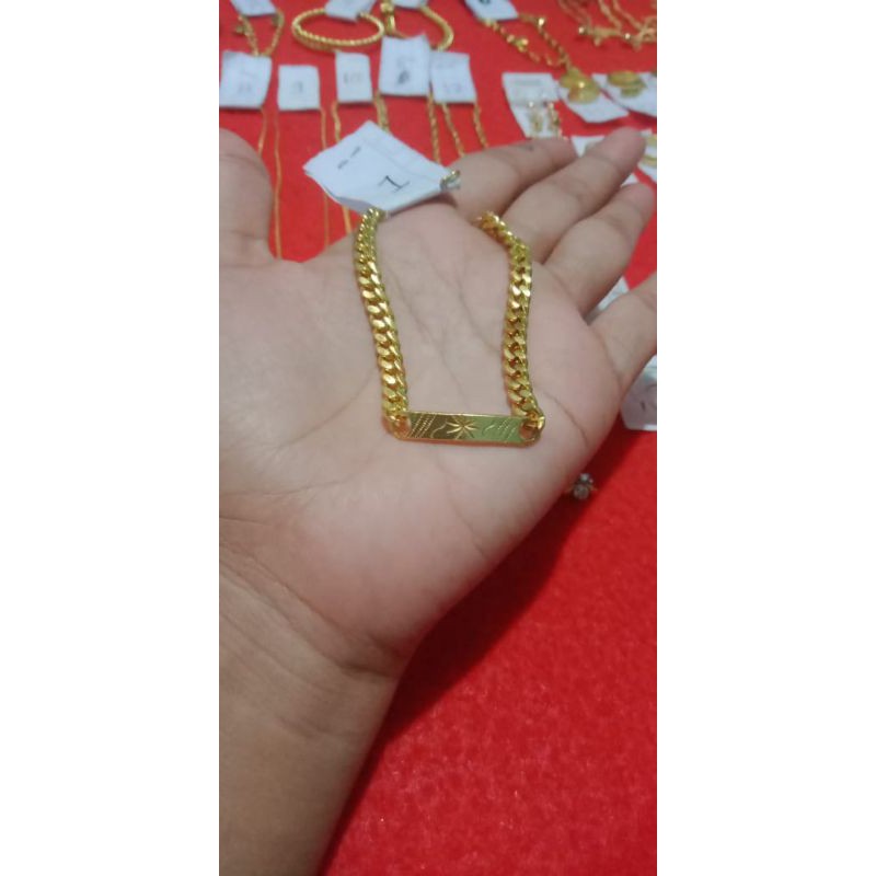 gelang berbahan dasar koin uang 1991