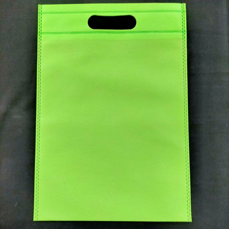 Tas kain plong ukuran 25×35 per lusin