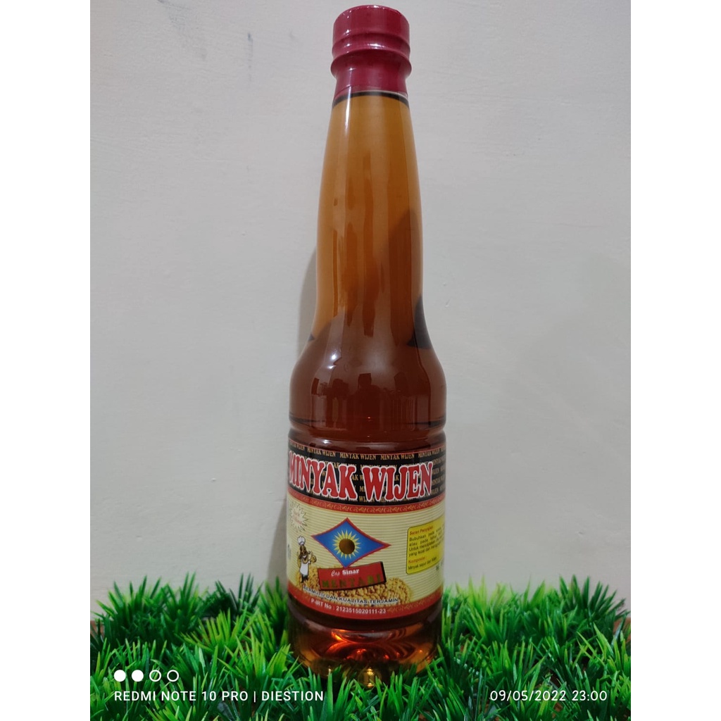 

Minyak Wijen Jumbo 600mL Kemasan Botol Plastik Cap Sinar Mentari