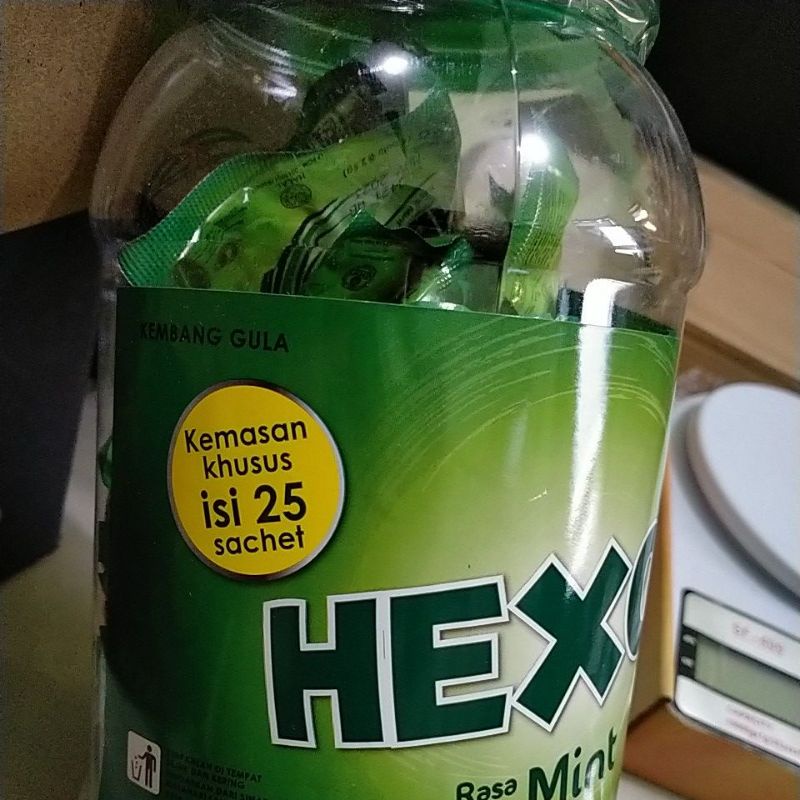 Hexos toples permen isi 50sachet.