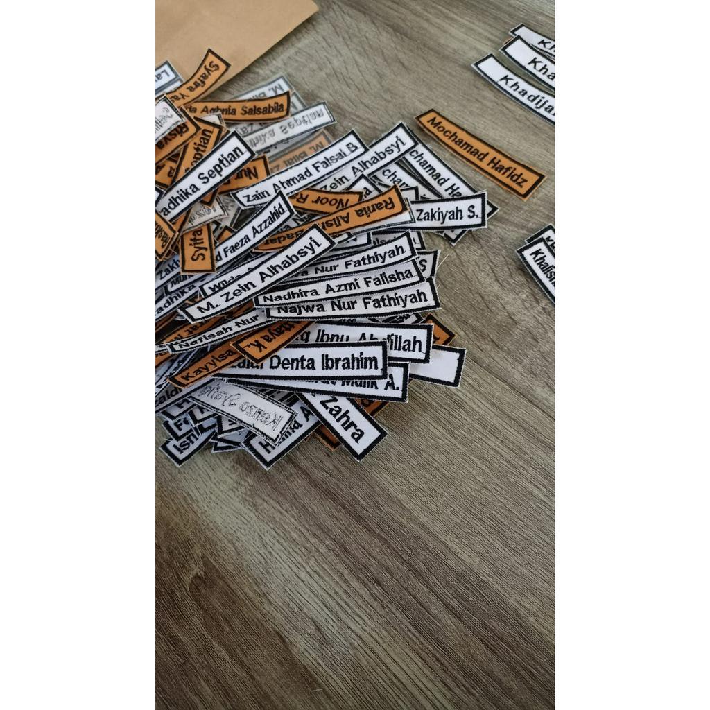 

Bordir name tag / nama seragam sekolah 1 HARI JADI