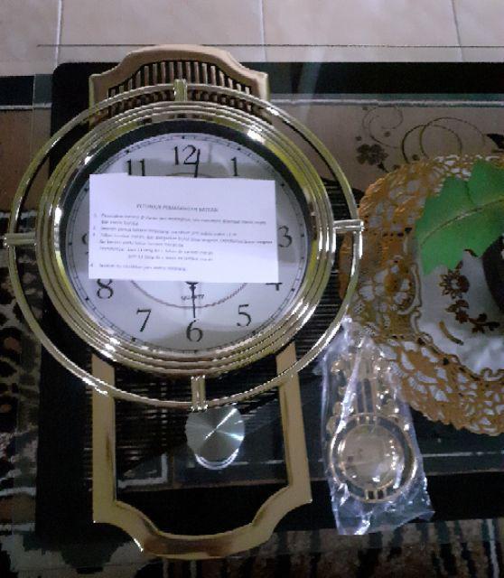 Jam Dinding Mirado Musik Bandul Goyang 937 Diameter 33cm