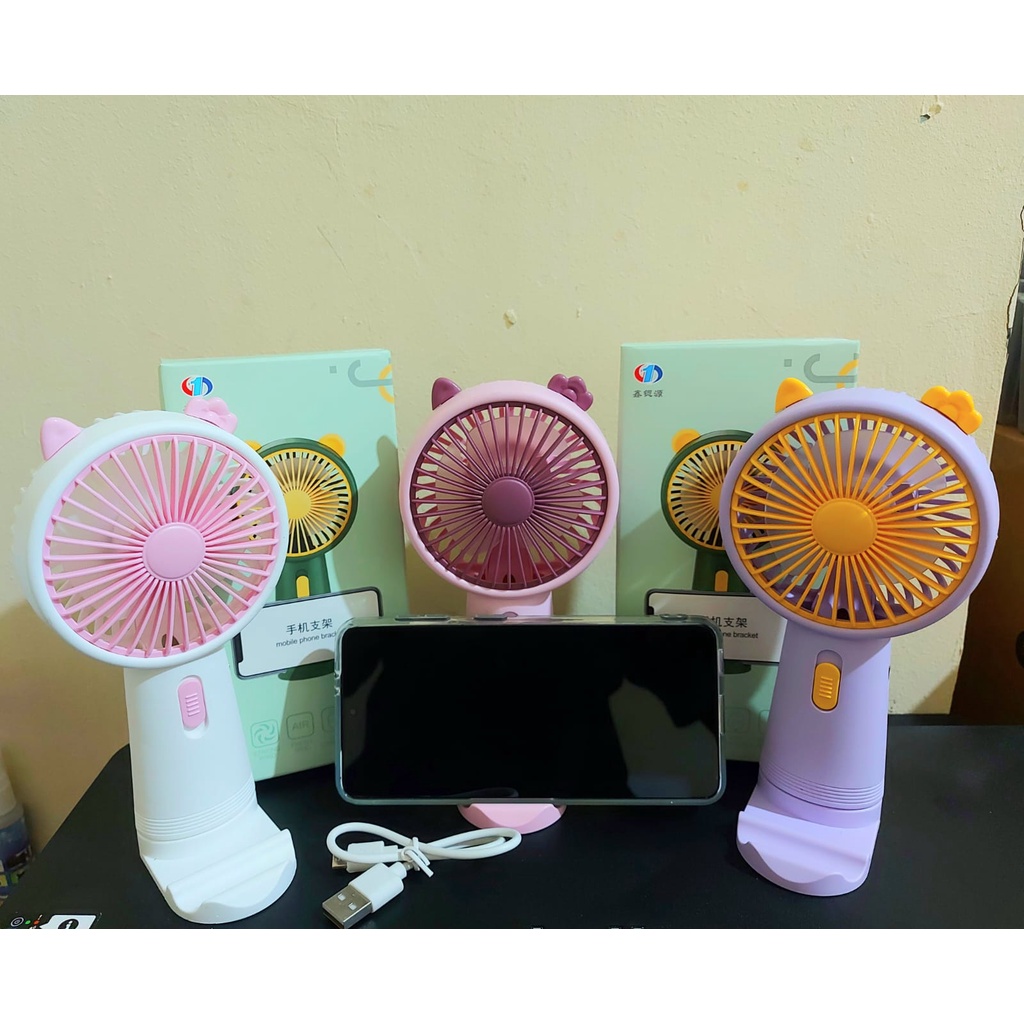 Kipas Tangan Mini Portable stand HP TERBARU IMPORT HELLO KITTY KELINCI DLL Kipas Angin Tancap Tangan LED Karakter / Kipas Genggam Portable USB Recharge (Standing Mini Fan)