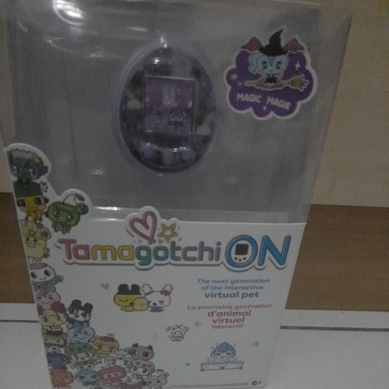 tamagotchi on purple preloved