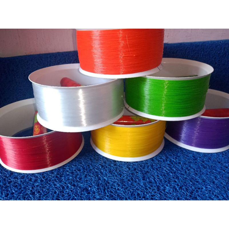 GULUNGAN/BLADU + BENANG/KENUR/SENAR/SULUR LAYANGAN 0.40 (Sedang) , dengan jenis gulungan paralon put