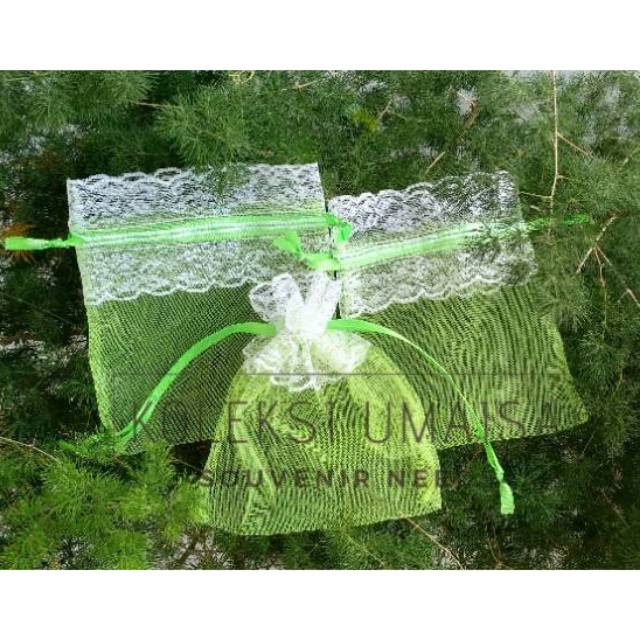 

Kantong tile souvenir tali serut kiri kanan