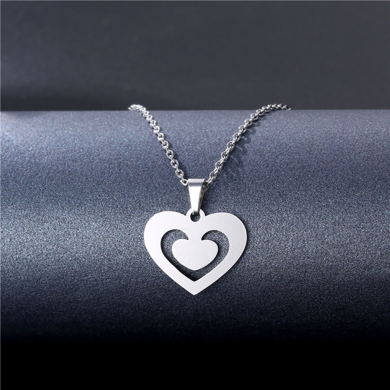 Aksesoris baru Eropa dan Amerika kreatif titanium steel INS gaya liontin berbentuk hati stainless st