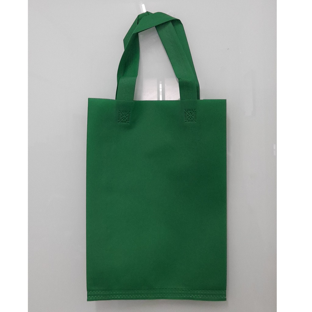 

Tas Press Spunbound Tali Goodie Bag Tas Belanja Warna Hijau Tua 25 cm x 35 cm