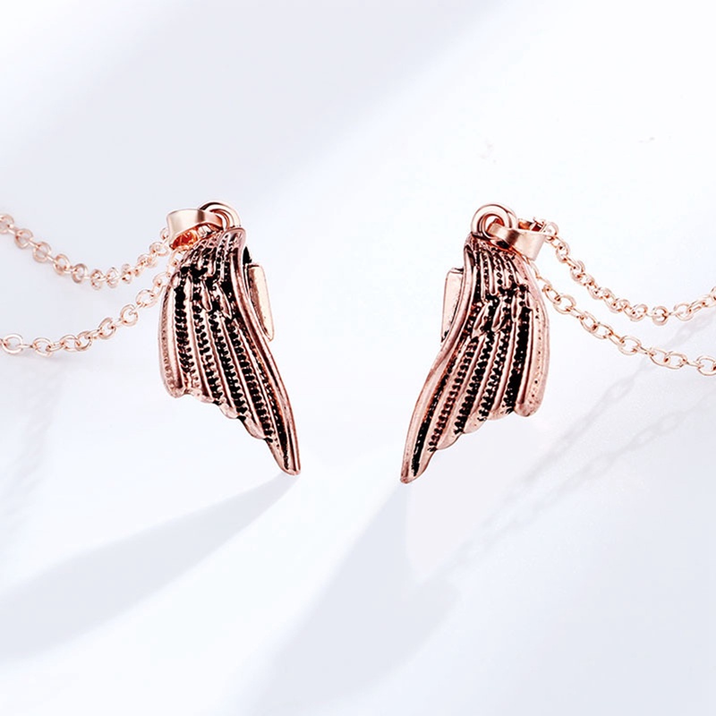 Fancyqube 2pcs / Set Kalung Rantai Liontin Sayap Malaikat Magnetik Gaya Punk Gothic Untuk Pria Dan Wanita