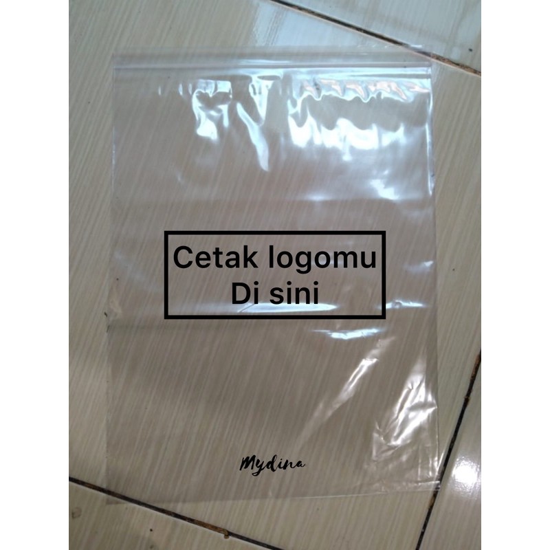 

Plastik Sablon Klip Bening ukuran 25x35 cm dengan Sablon 1 Sisi 1 Warna