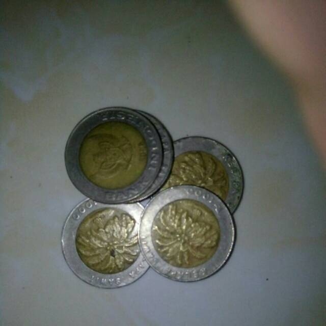 Uang kuno Indonesia  1000 rupiah isi 5 gambar kelapa sawit