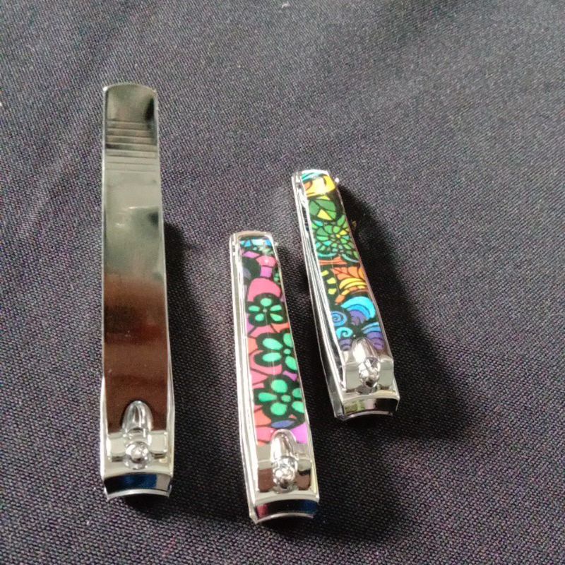 naim_surya_asemka_gunting kuku motif rige