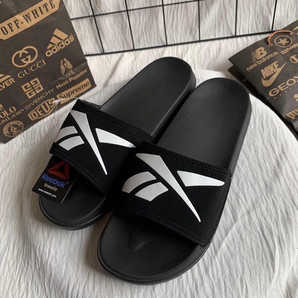 Sandal Cowok Slipon Simple Keren SANDAL KEKINIAN SLIP ON DISTRO PREMIUM SLOP PILON IMPORT SANGAT RINGAN DIPAKAI DAN ANTI AIR FREE PAPERBAG Sandal Slop Polos Slide Pria Import Sandal Cowok Slipon Simple Keren  FLIPFLOP PRIA WANITA REBOKCROSSFIT BLACK