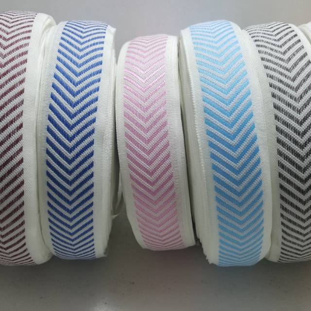 List bisband webing springbed motif panah