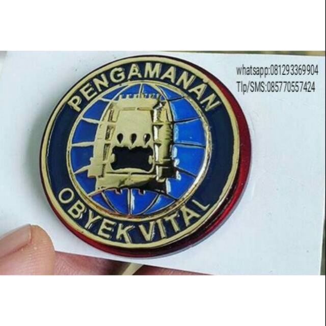 Monogram pin  pengaman objek vital