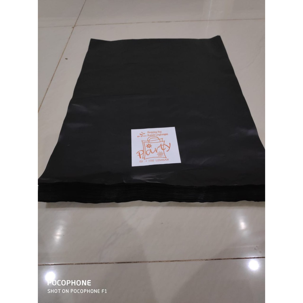 KANTONG PLASTIK OVAL TANPA PLONG HITAM TEBAL 25X35