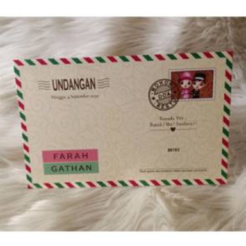 Undangan nikah motif amplop muslimah