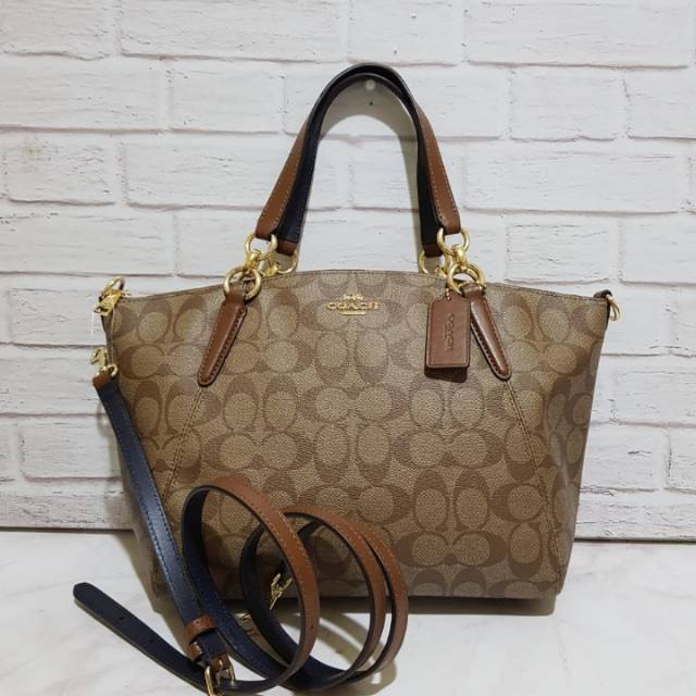 Coach small kelsey pvc signature sadle/chalk original