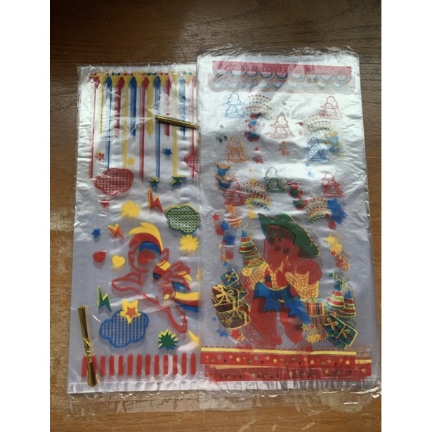 

Plastik snack ultah 18cm X 35cm isi 30 pcs