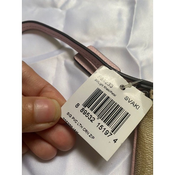 dompet coach small wrislet in signature jacquard pink