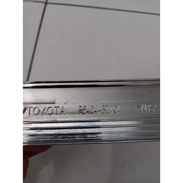 Lis list chrome tempel  bemper depan bawah Toyota calya original