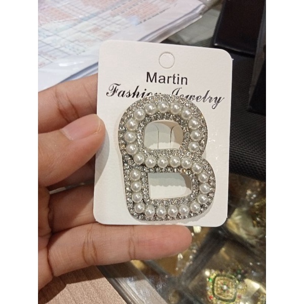 Bros button mix mutiara besar