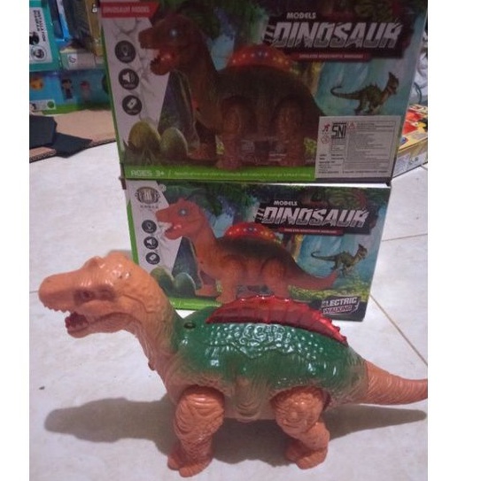 mainan Dinosaurus jalan baterai