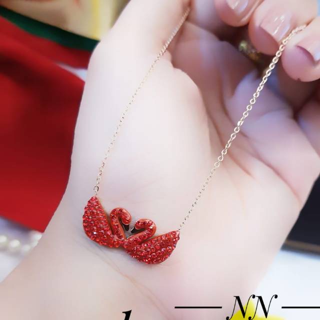 Titanium kalung merah awet 2006