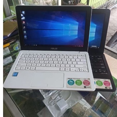 Netbook & Laptop murah  ASUS E202 Zom dan Online ok