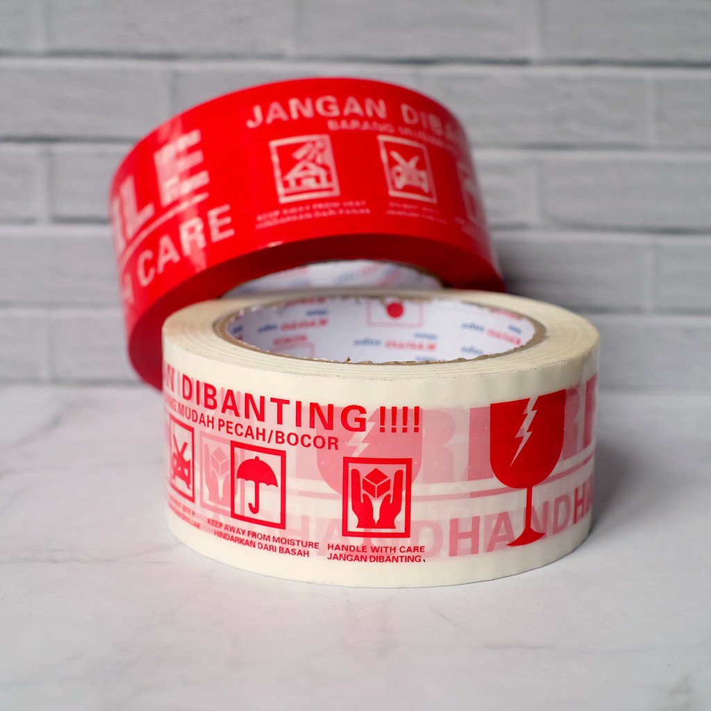 LAKBAN FRAGILE 48 MM 80 YARD - ISOLASI FRAGILE JANGAN DIBANTING ONLINE SHOP MERAH PUTIH SEGEL